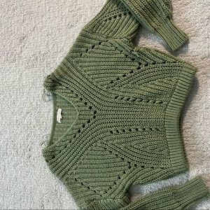 Cropped sage green knitted sweater